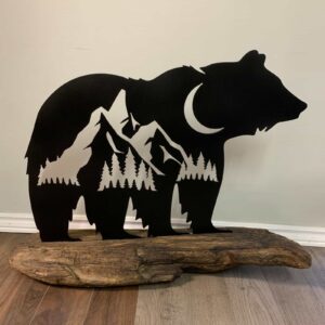 Bear on driftwood