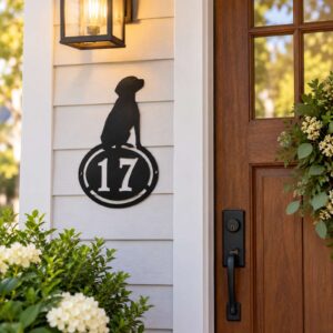 Personalized Dog House Number Metal Address Sign installed in a realistic outdoor setting; Dog-themed metal house number sign with example 17 beside home front door.